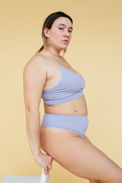 Plus size woman portrait - Real body type - Soft pastel color