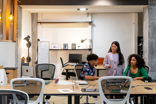 Diverse coworkers working in a coworking space
