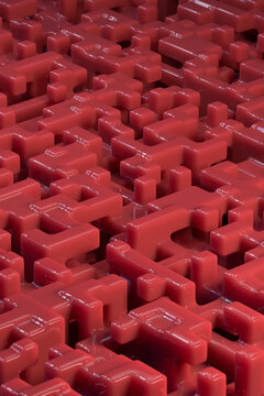 Red plastic geometric shape