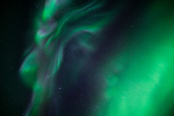 Northern Lights Creates a Display of Light and Color On the Starry Sky