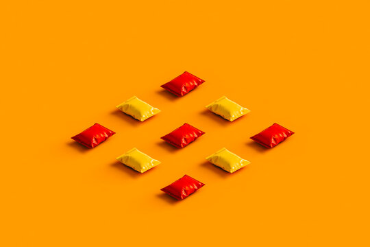 collection of orange and red chips packages with no label.
