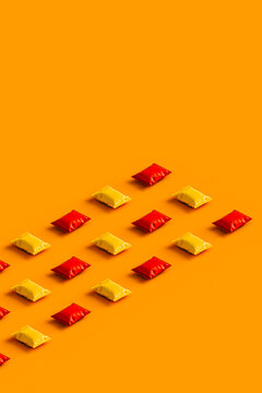 3d render of orange and red chips packages with no label.