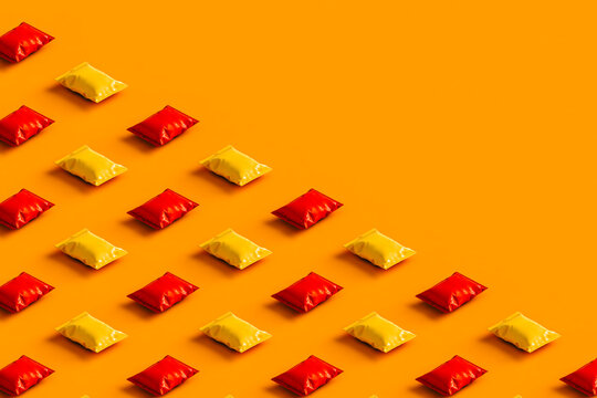 3d render of orange and red chips packages with no label.