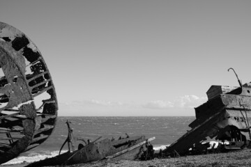 remains of an old ship on the beach