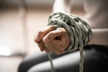 Slavery Victim And Hostage Tied By Rope