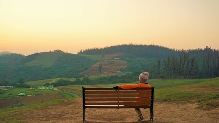 Tourists enjoying the Beautiful view of Wenlock Downs 9th Mile Shooting Point, Ooty during sunset....