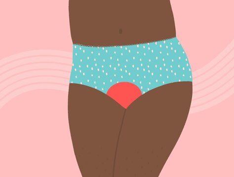 Black woman in panties with menstruation