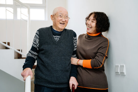 Asian woman and senior father