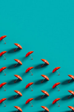 3d rendered red umbrellas in lines
