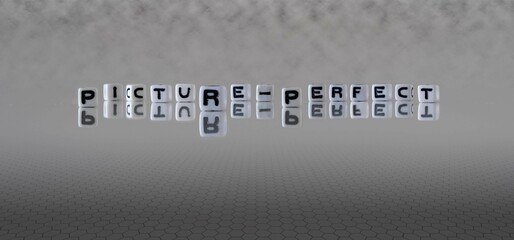 picture perfect word or concept represented by black and white letter cubes on a grey horizon...