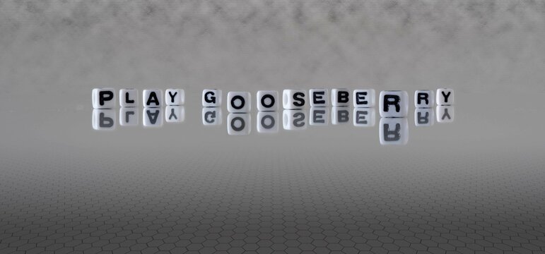 play gooseberry word or concept represented by black and white letter cubes on a grey horizon background stretching to infinity