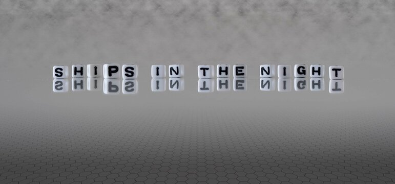 ships in the night word or concept represented by black and white letter cubes on a grey horizon background stretching to infinity
