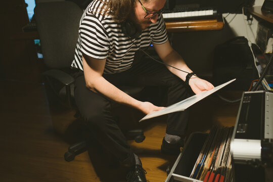 Man holding a Vinyl Record 