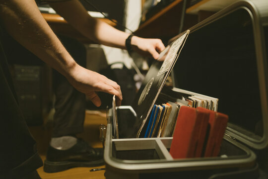 Man digging for some vinyl records