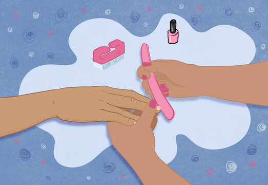 Two anonymous women giving and recieving a manicure