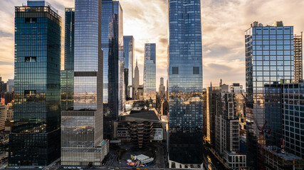 Modern skyscrapers in megapolis of lower Manhattan at sunset  