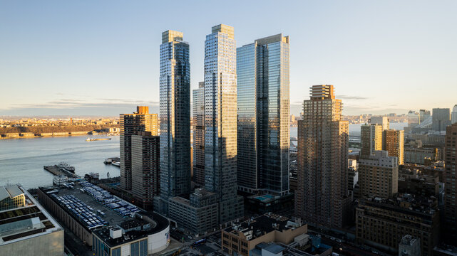 Modern skyscrapers in megapolis of lower Manhattan at sunset 