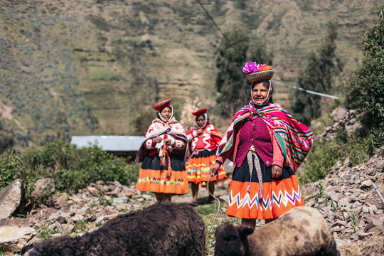 Peruvian women in traditional clothing in the countryside