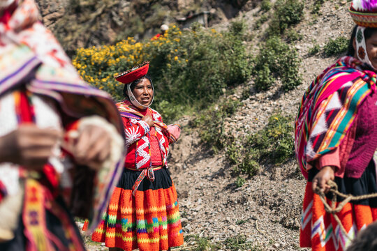 Peruvian women in traditional clothing in the countryside