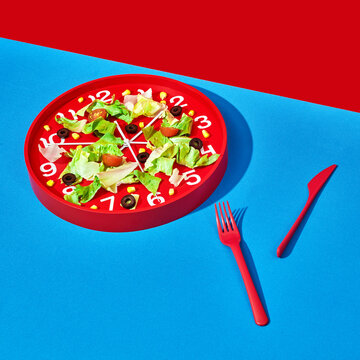 salad on a red clock