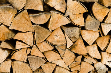 Neatly arranged stockpile of wood for winter