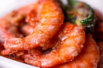 Fried king shrimps close-up, tasty, crispy, large, photo with shallow depth of field. Delicious food concept.