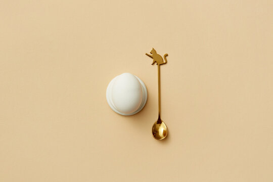 Egg and golden spoon