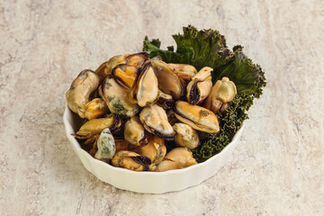 Tasty marinated mussels in the bowl