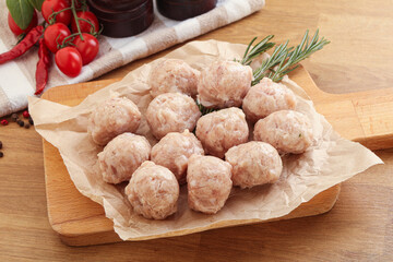 Raw chicken meatballs for cooking