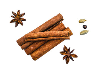 Cinnamon stick and star anise isolated on white background close up. canella seasoning. Background of fragrant seasoning. Flat lay, top view.