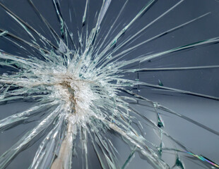 broken tempered glass close-up, glass background was broken close-up