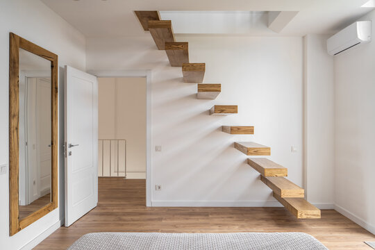 Three-level flat in modern style with stylish staircase