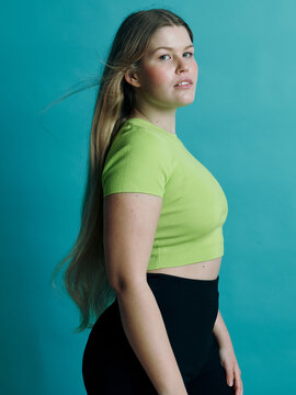 fearless and attitude studio portrait - windy hair - glowing skin