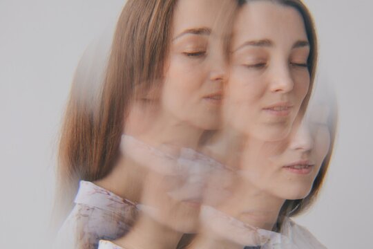 Daydreaming woman - multi exposure portrait 