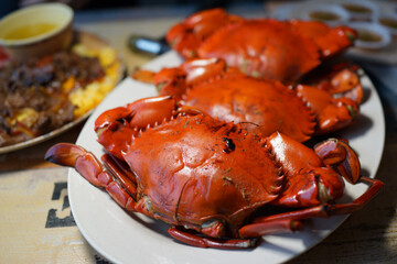 Grilled Giant Mud Crabs On White Plate. Soft focus image.