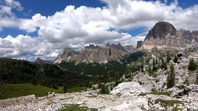 Amazing landscape on the Dolomites. Time lapse to the peaks called Conturines,  Pizes de Fanis, Lagazuoi and Falzarego mountain pass.  Alta Badia, Sud Tirol, Italy