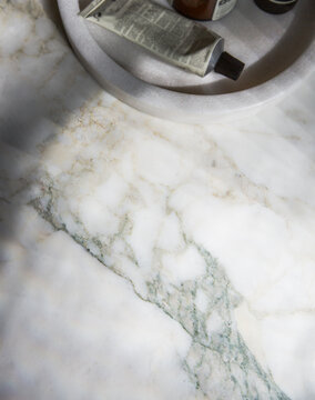 Flat lay background of marble bathroom bench top