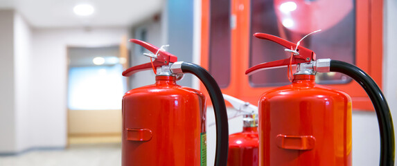 Fire extinguisher, Close-up red fire extinguishers tank in building concepts of fire equipment for...