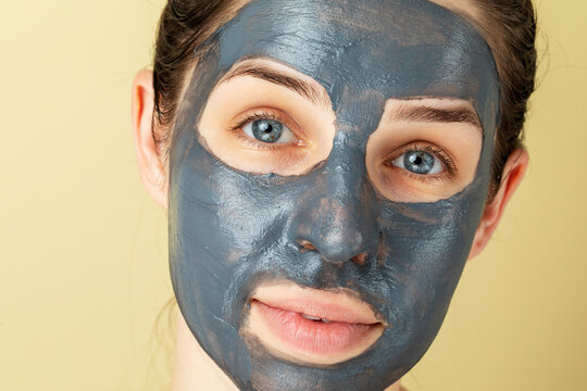 Portrait of woman doing a facial skincare treatment 