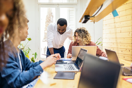 Men colleagues working in the office