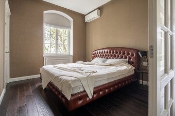Interior in modern style with large bed