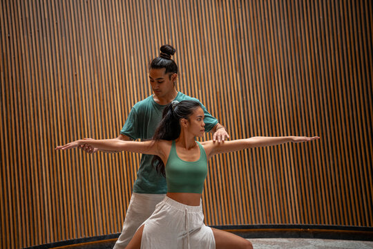 Together learning yoga pose