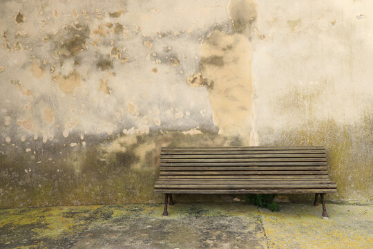 bench against old wall