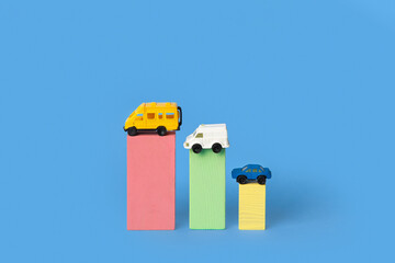 Сolored cubes and toy cars over it