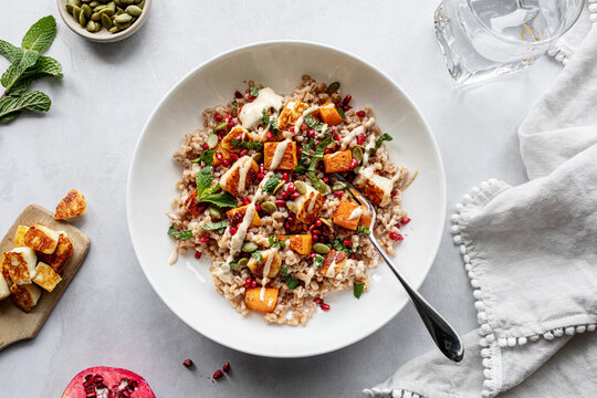 farro, squash, pomegranate bowl