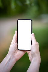 Close-up woman holding phone with modern design on blurred background