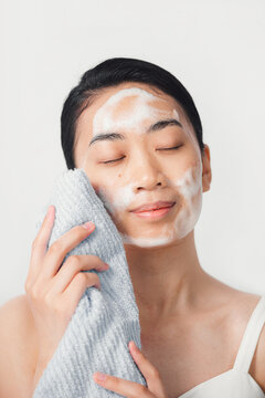 Lovely girl making cleansing procedures.