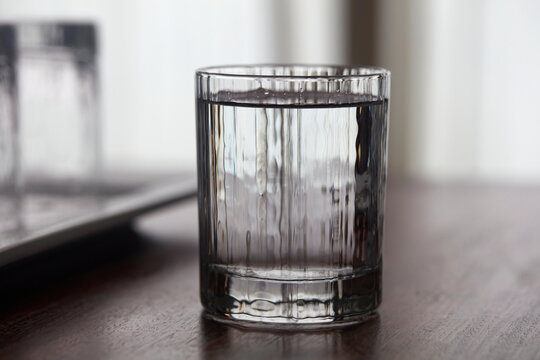 Closeup transparent crystal glass cup

