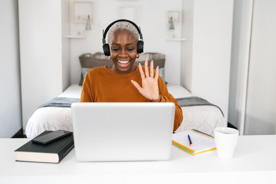 Freelancer making video call in bedroom
