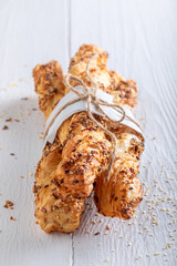 Delicious bread sticks baked in rustic kitchen.